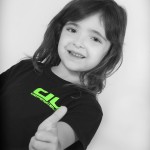 young girl 2 thumbs up for kidz martial arts